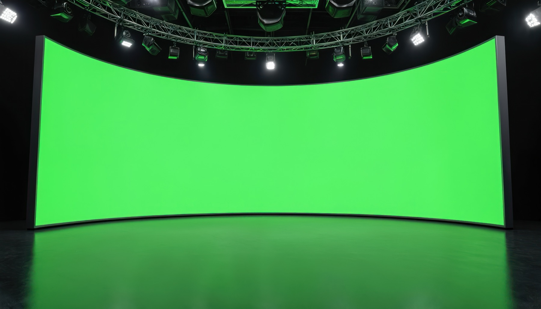 Broadcast studio with a curved LED backdrop wall and an overhead lighting truss